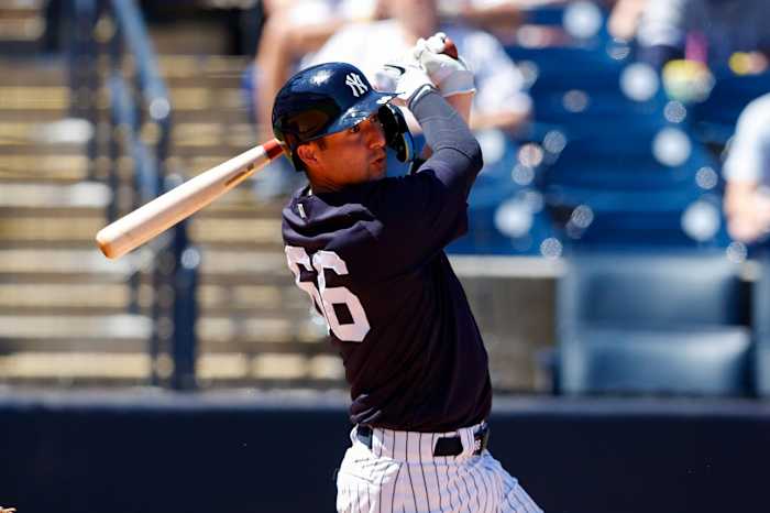 Yankees catcher Kyle Higashioka swings in spring training